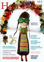 Omslag Hemslöjden nr 5/08: docka i folkdräkt med gröna glasögon